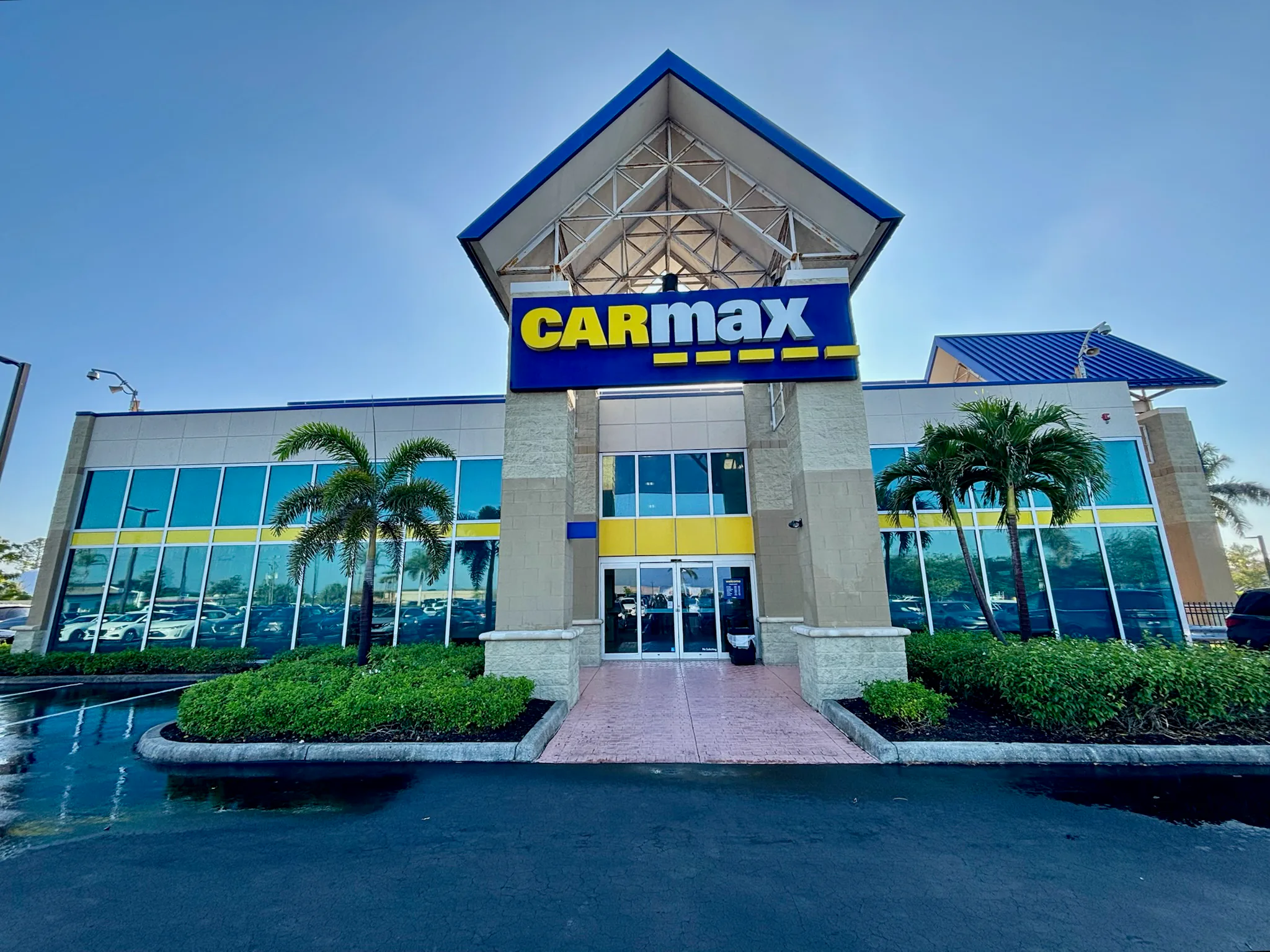 SNR commercial pressure-washing service in progress at a CarMax property