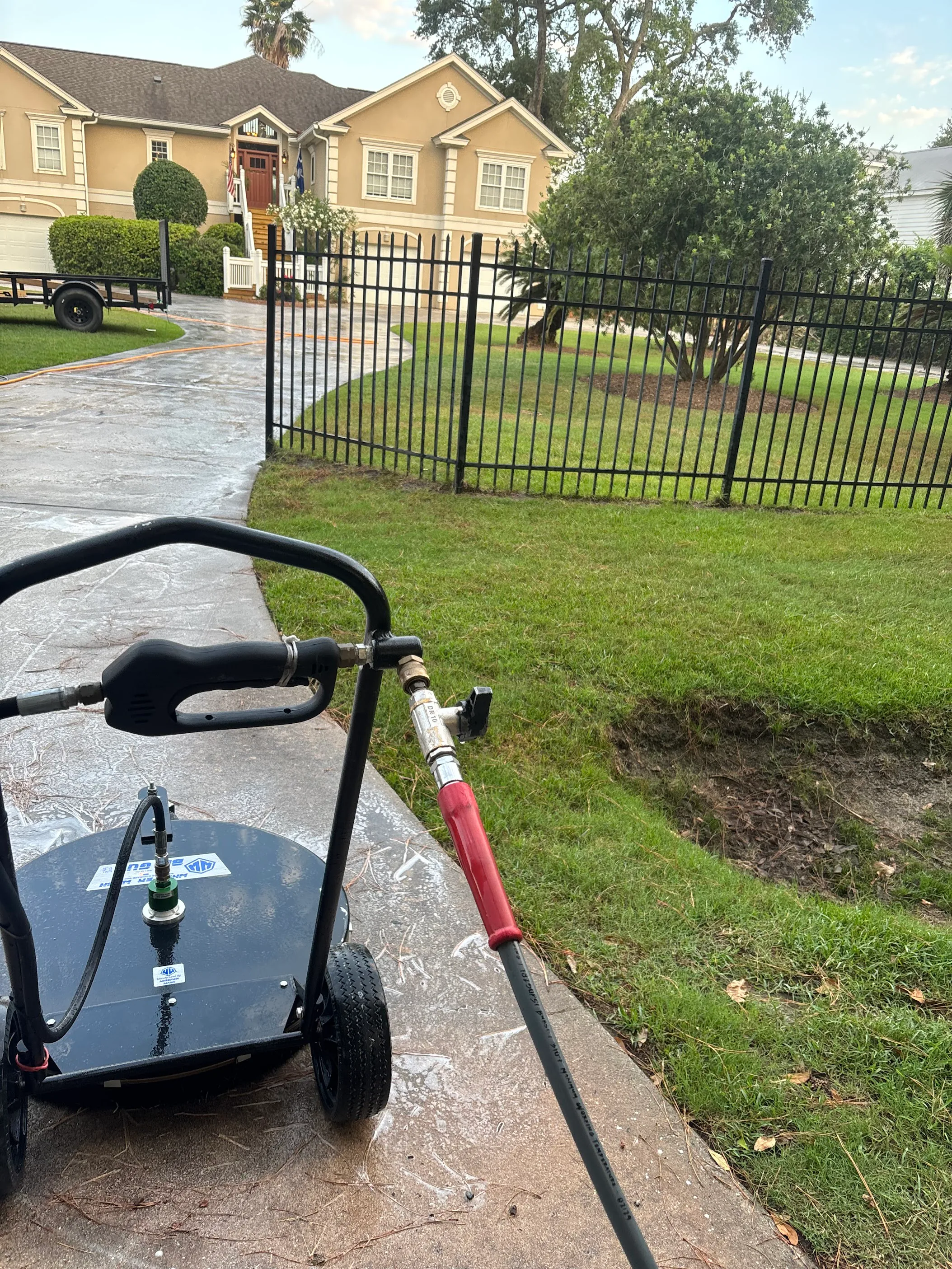 Long driveway in Naples, FL after a complete SNR pressure-washing service