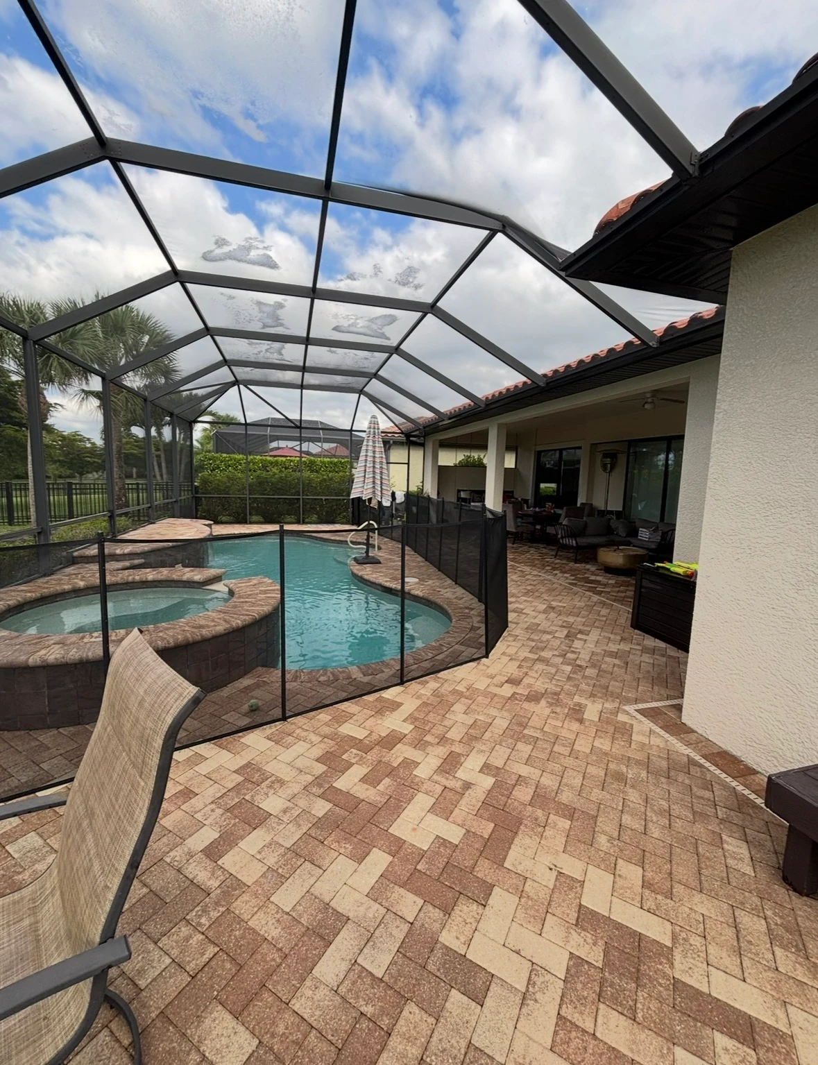Paver patio after SNR paver sealing, with rich restored color and a protected surface