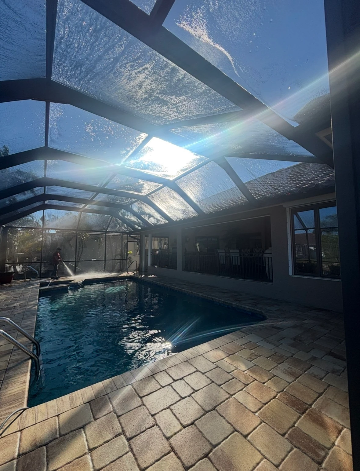 Cool-deck pool surround after SNR pressure washing, with calcium and stains removed
