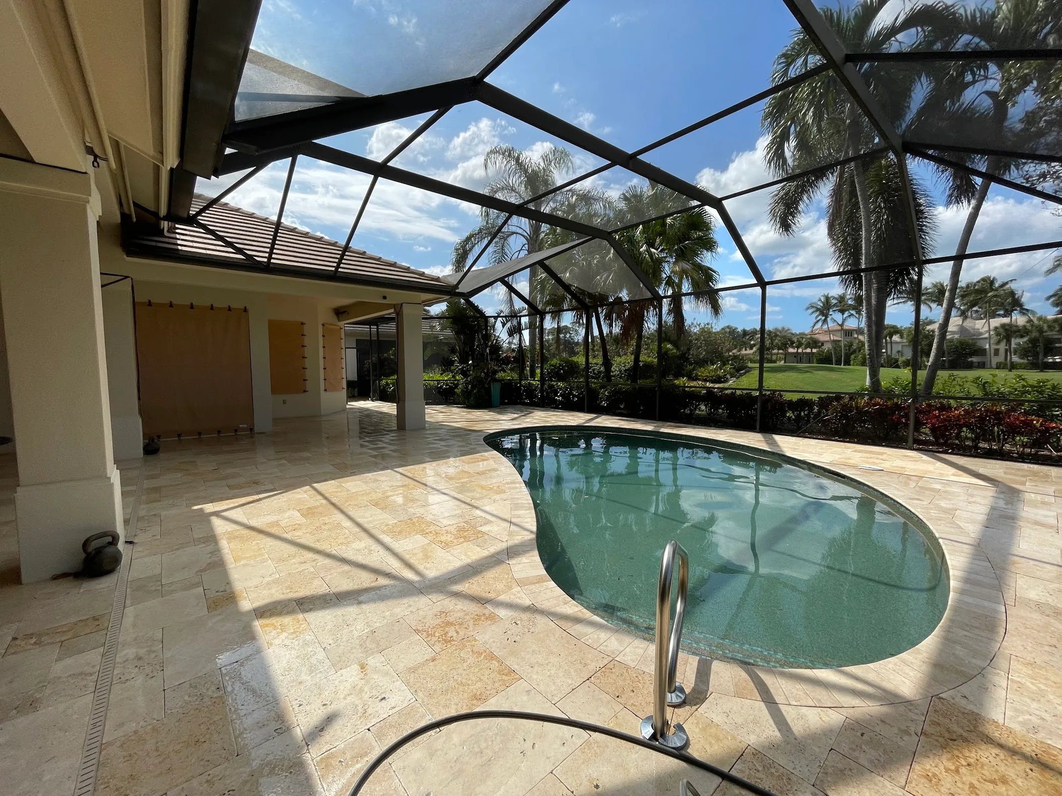 Pool deck after SNR pressure washing, restored to a bright, slip-resistant finish